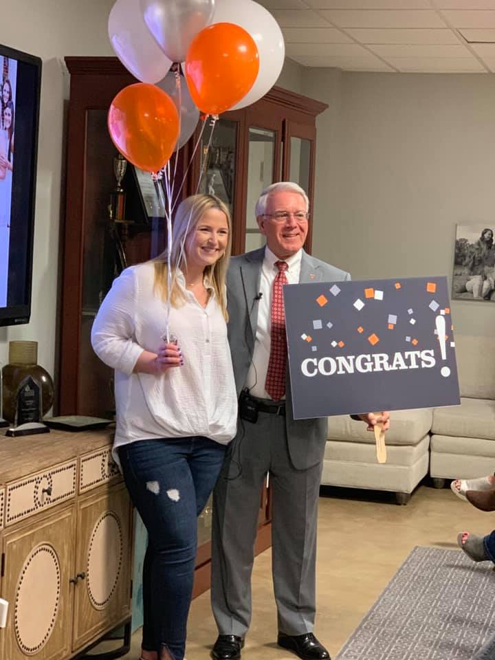 Interim Chancellor Wayne Davis presents Longmire with Torchbearer award at her sorority meeting