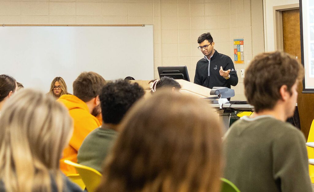 Doctoral student Aman Misra teaches a class.