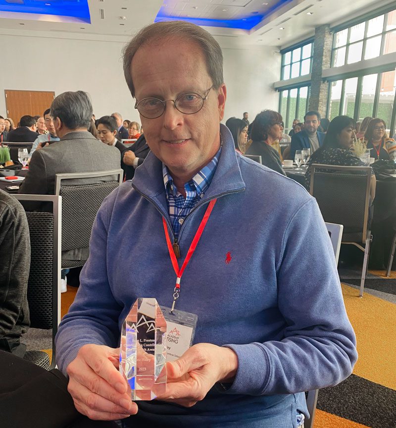 Tombras School of Advertising and Public Relations Professor Eric Haley with his 2023 Ivan L. Preston Outstanding Contribution to Research Award from the American Academy of Advertising.