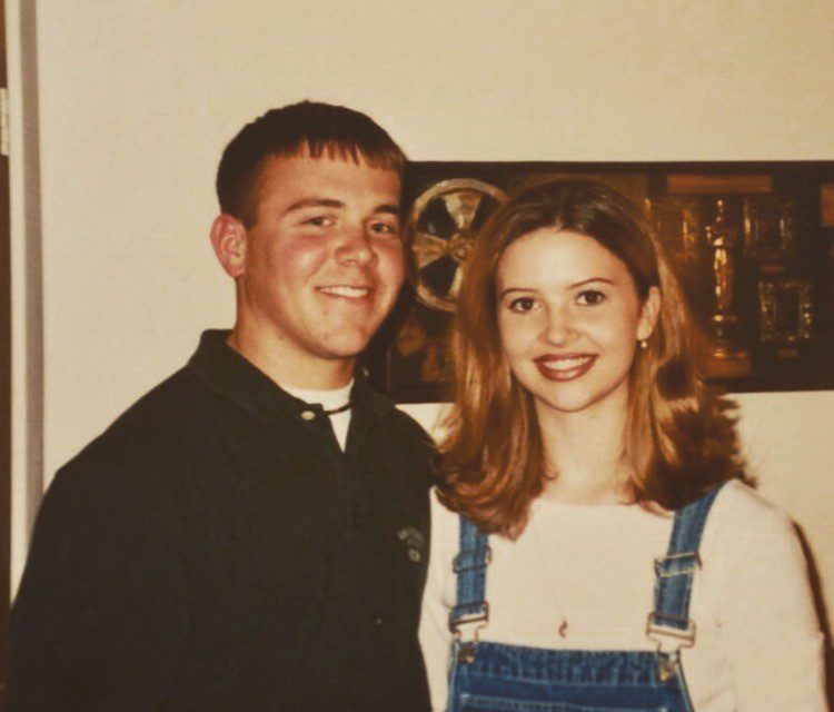 A young Eric and Tyra Haag pose together for a high school photo.
