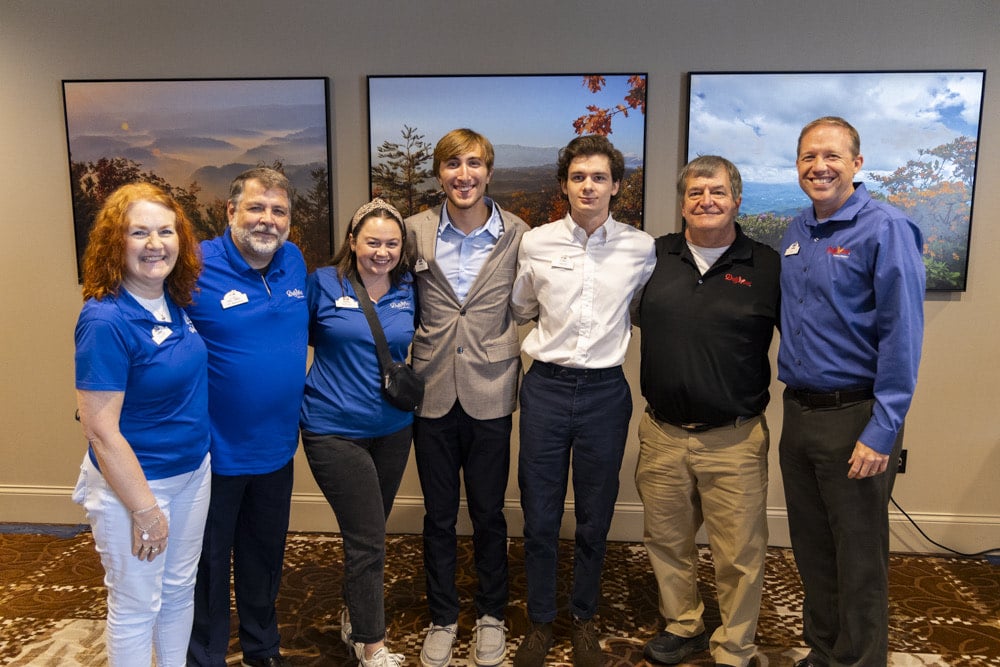 Rian Fann (middle) with internship cohort and Dollywood staff