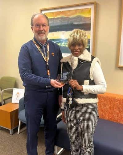 Professor Thura Mack (’86) recieving 45 years of service award